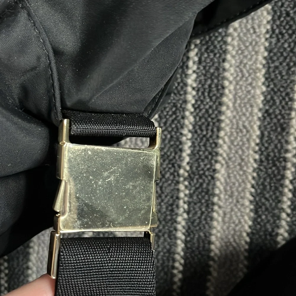 Tory Burch diaper bag. Gently used. black. Includes changing pad.